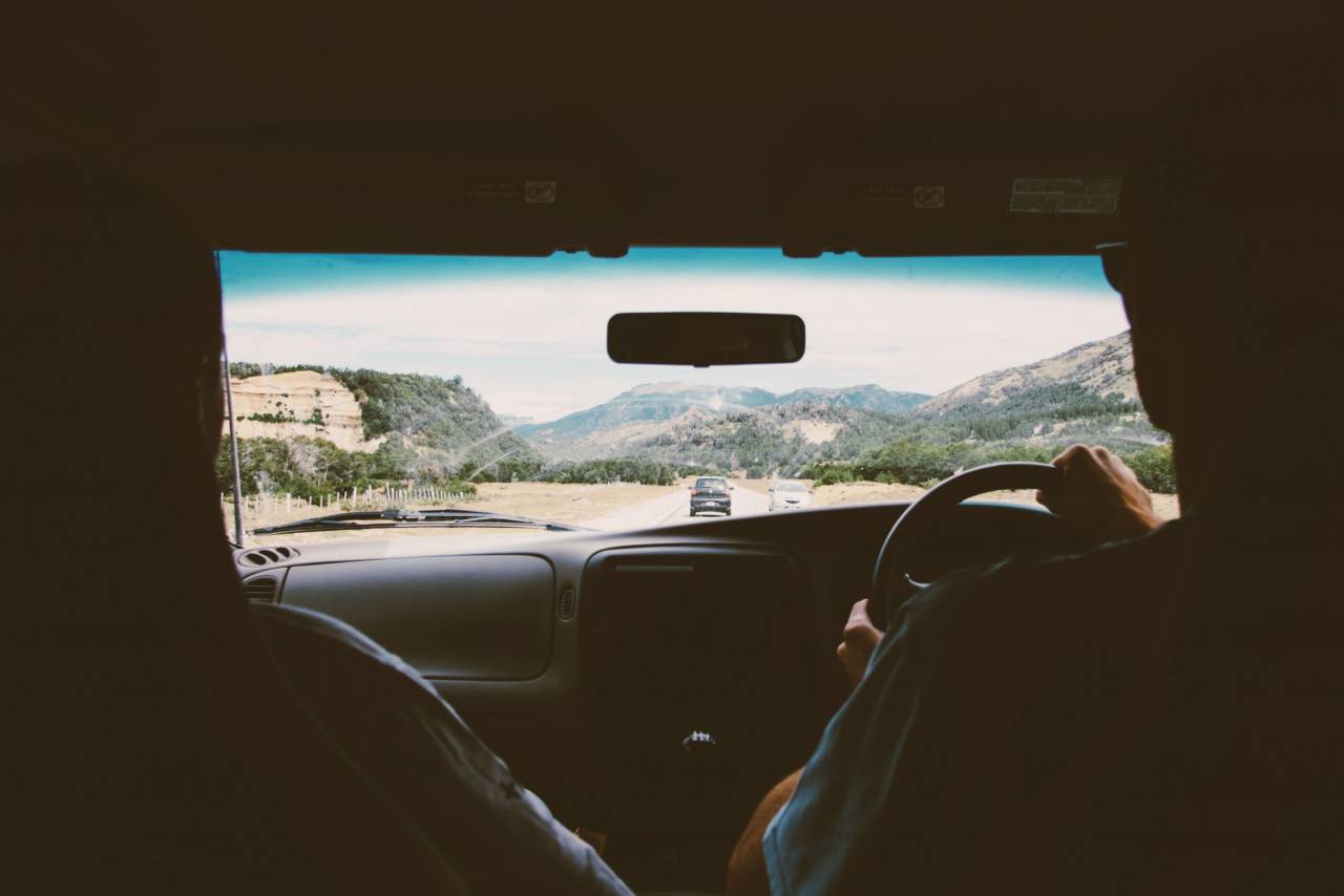 people, couple, girl, man, drive, ride, car, vehicle, road, trip, travel, mountain, sky, clouds
, 