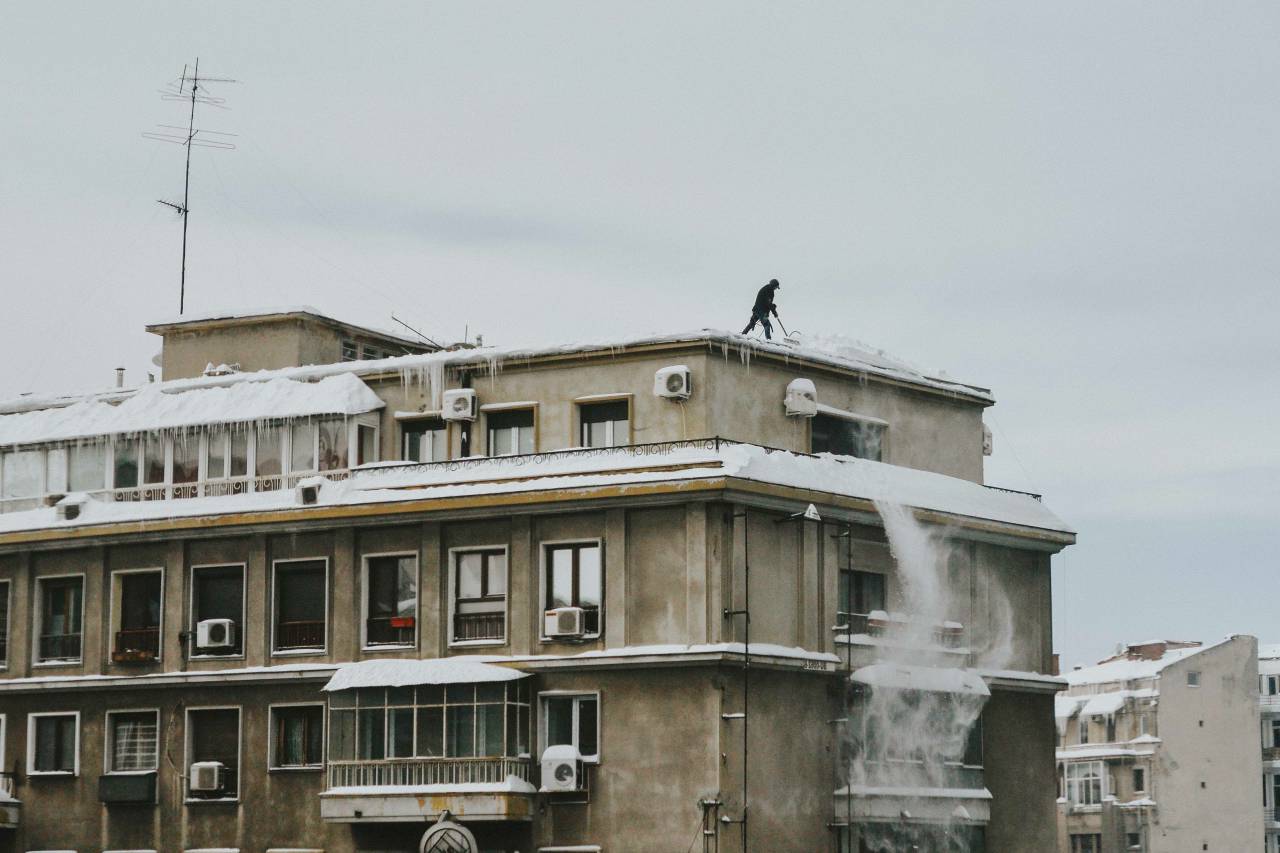 architecture, building, infrastructure, people, man, alone, rooftop, snow, winter, sky, cold, weather
, 