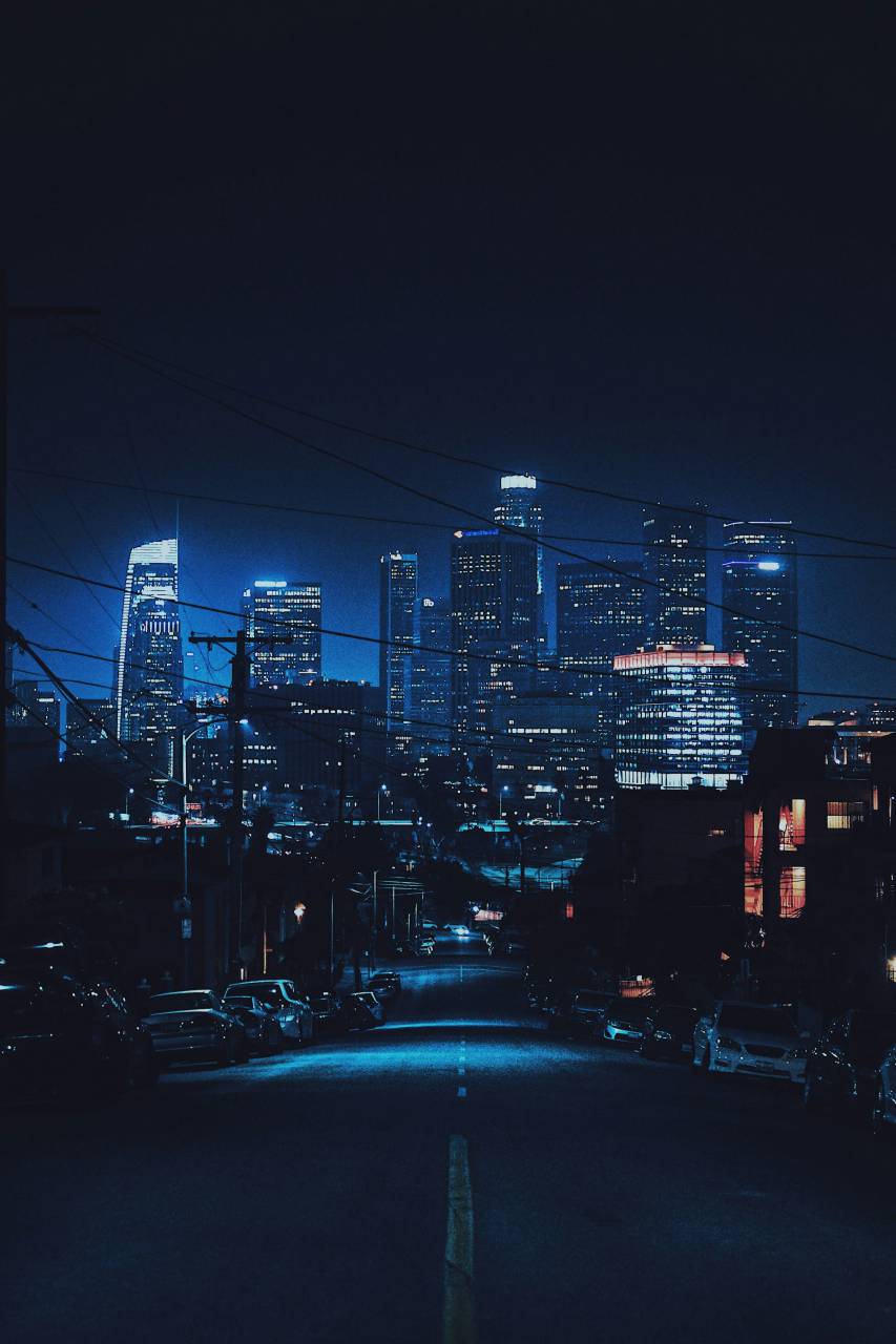 cyberpunk, city, skyline, neon lights, futuristic, night, urban landscape, dystopian, megacity, towering structures, advertising, holographic displays, 
