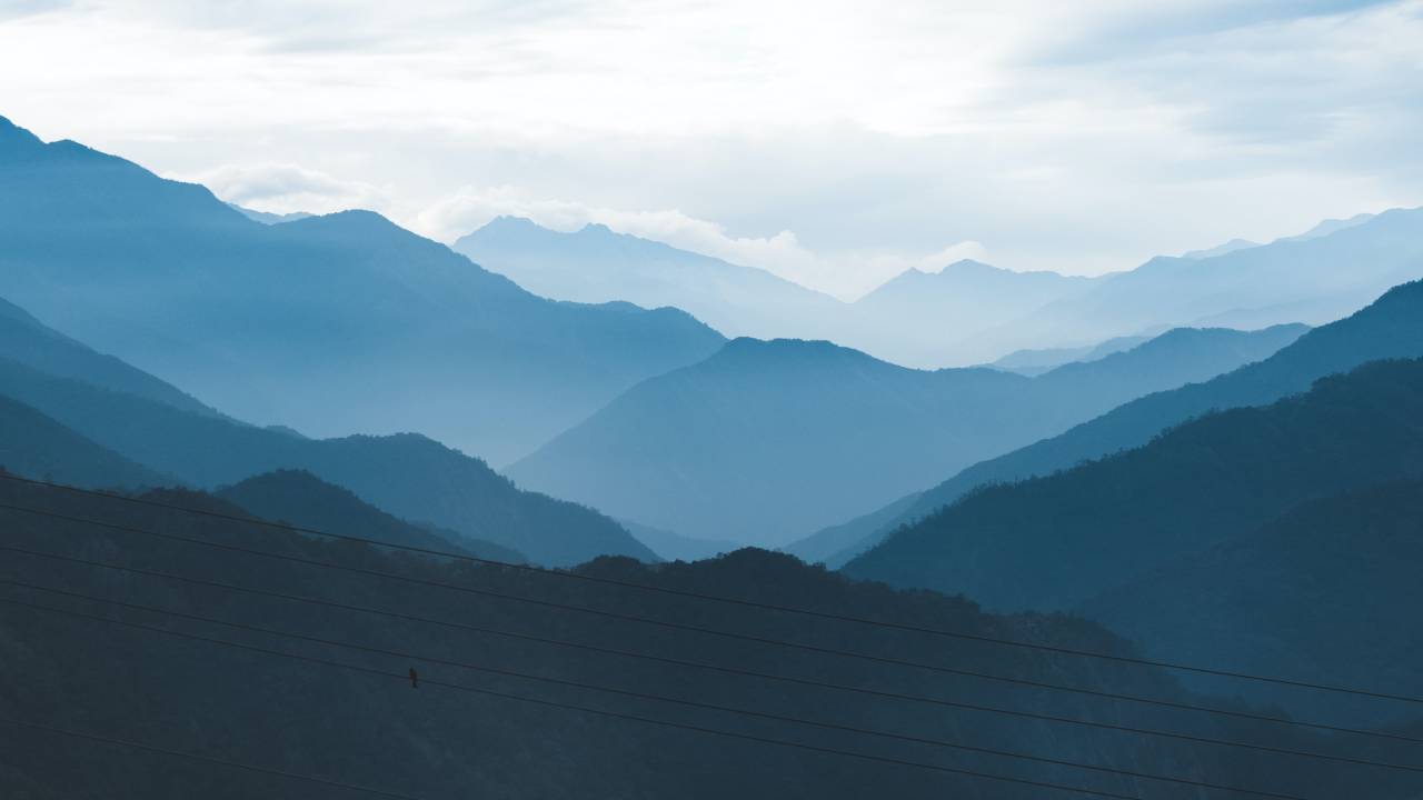 mountain;landscape;blue,mountain,nature,outdoors,blue,landscape,mountain range,mountain peak,cloud,sky,snow,forest, 
