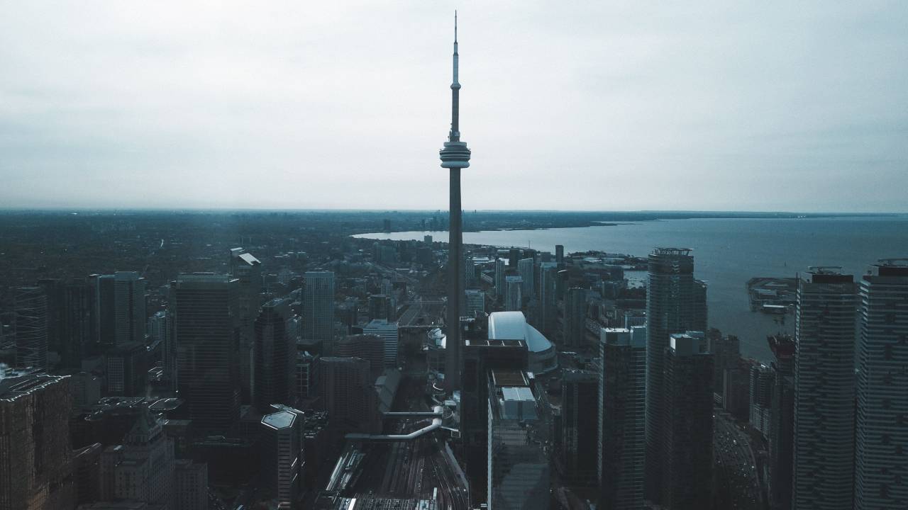 architecture, building, infrastructure, sky, skyscraper, tower, city, urban, skyline, landmark, sea, ocean, view, horizon, dark, rooftops
, 