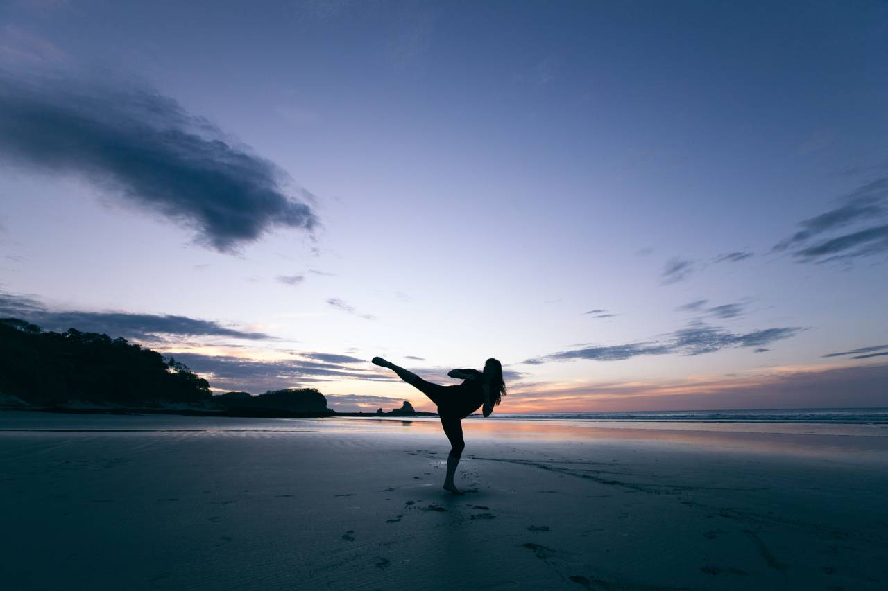people, woman, dark, sky, clouds, coast, beach, sea, water, ocean, nature, tree, mountain, footprints, kicking
, 
