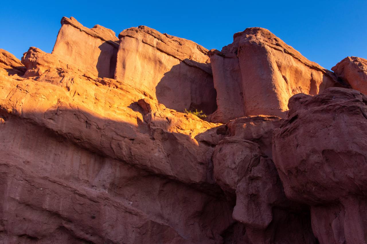 Salta Province, Valle de Calchaquies, Arid Climate, Cordillera, Famous Place, Beauty In Nature, Journey, Travel Destinations, Outdoors, Red, Sandstone, Desert Area, No People, Landscape, Scenery, Nature, Scenics, Mountain, Travel, Road, Geology, Valley, Rock, Object, Canyon, Adventure, Dirt Road, Rock Formation, Sky, Hill, Extreme Terrain, Mountain Range, Andes, Road Trip, Exploration, Eroded, Sunny, Environment, Pinnacle, Sand, Dry, Remote Location, Clear Sky, Altiplano, Majestic, Wind, Barren, Sedimentary Rock, High Angle View, latinamerican, 
