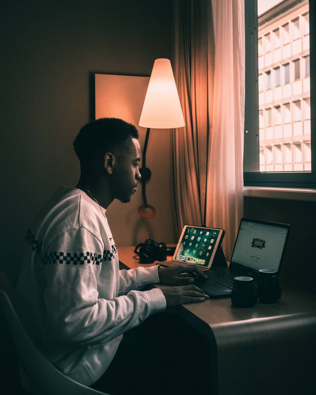 black, young, laptop, computer, business, modern, professional, person, technology, lifestyle, office, zoom, adult, occupation, distance education, casual, sitting, african ethnicity, male, manager, ethnicity, one, home, african, man, descent, laptop webinar, expertise, confidence, indoors, coworker, work, businessman, worker, application job, internet, only, working, inspiration, using, intelligence, people, desk, wireless, clothing, entrepreneur, internet wireless, 