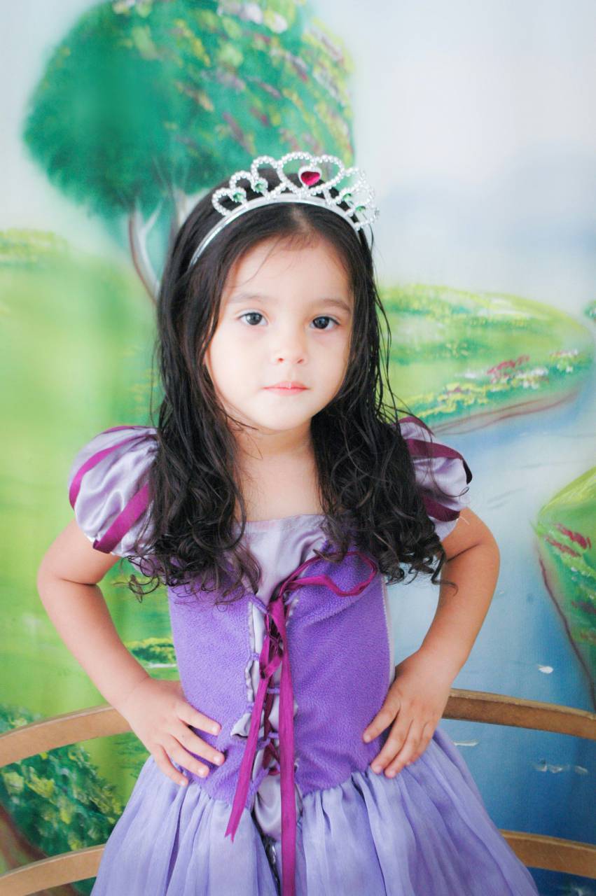 purple;little girl;princess,child,cute,girls,childhood,smiling,small,cheerful,caucasian ethnicity,one person,portrait,happiness,fun,crown,beauty,princess,joy,lifestyles,dress,outdoors,summer,looking at camera, 