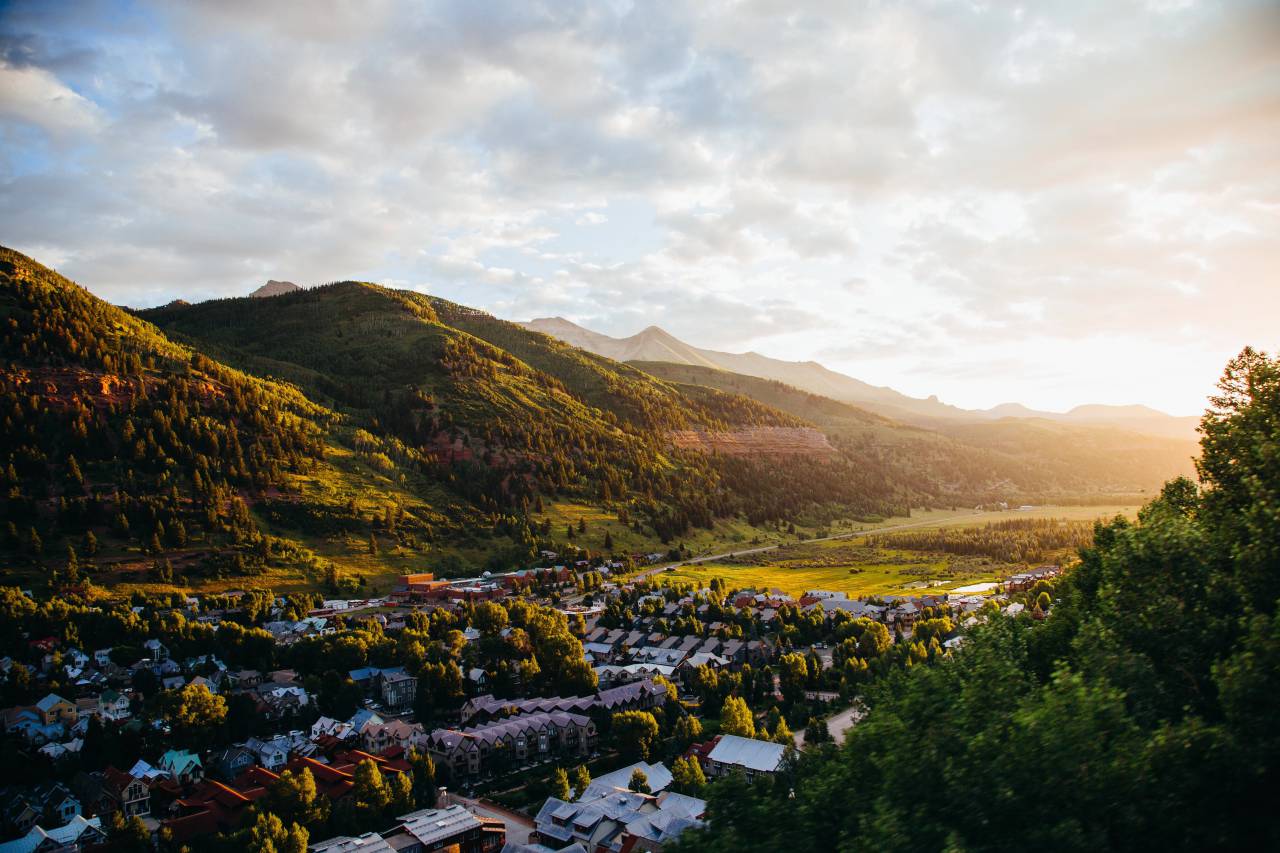 city, town, village, houses, homes, mountains, hills, valleys, green, grass, sunshine, landscape, nature, sky, clouds
, 