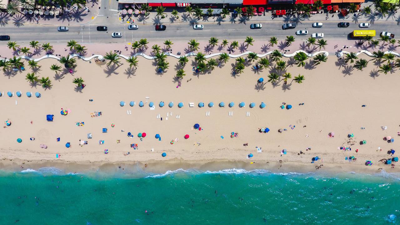 people, man, woman, travel, adventure, vacation, beach, ocean, sea, trees, car, transportation, vehicle, road, umbrella, waves, sand, summer
, 
