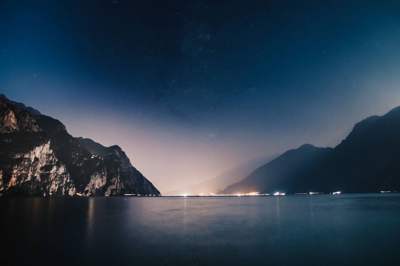 sea, ocean, water, wave, nature, night, dark, blue, sky, mountain, hill, landscape, lights, horizon, nature, outdoor
, 