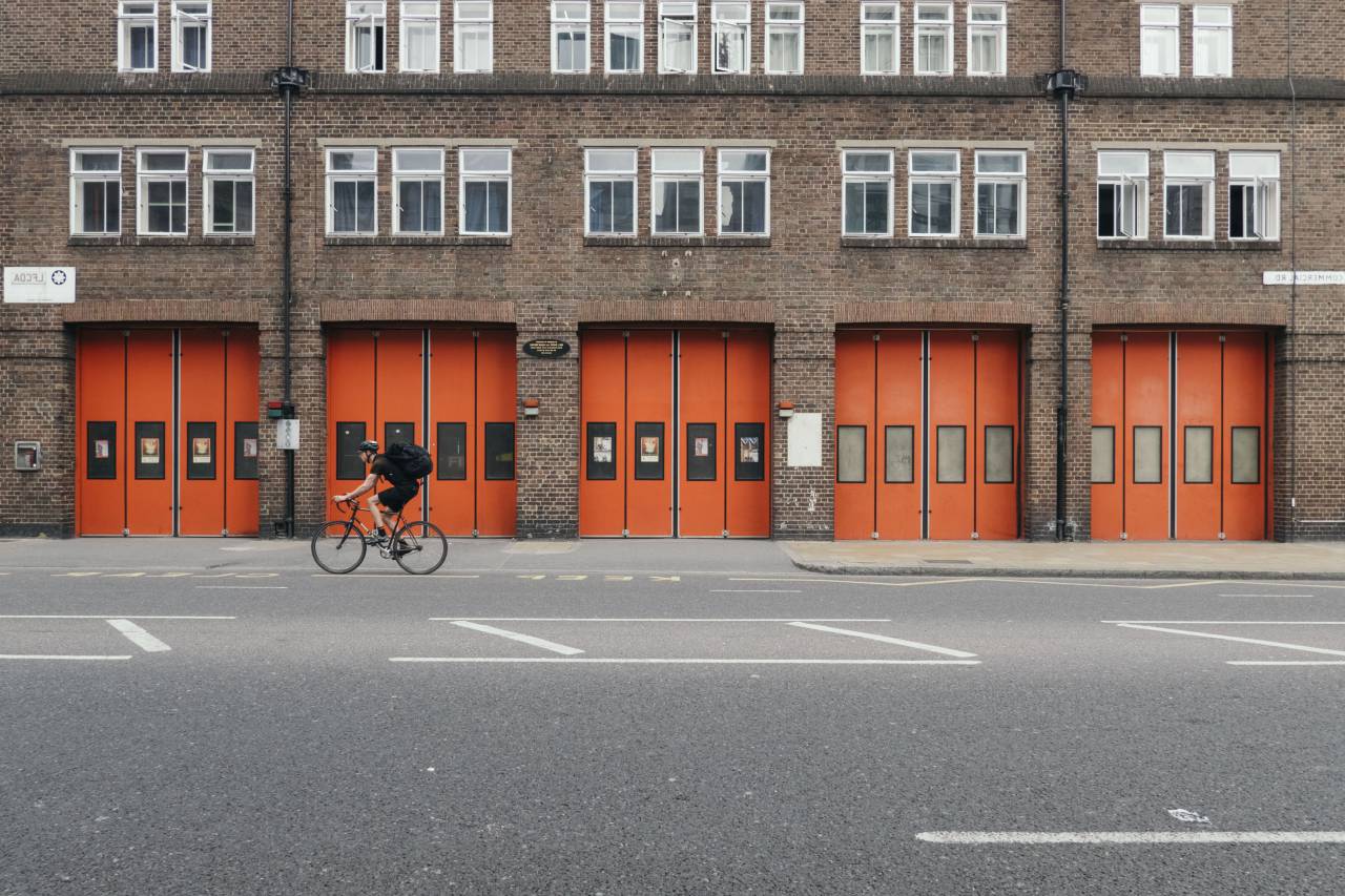 architecture, building, infrastructure, structure, establishment, apartment, windows, condominium, hotel, people, man, bike, bicycle, cycle, helmet, road
, 