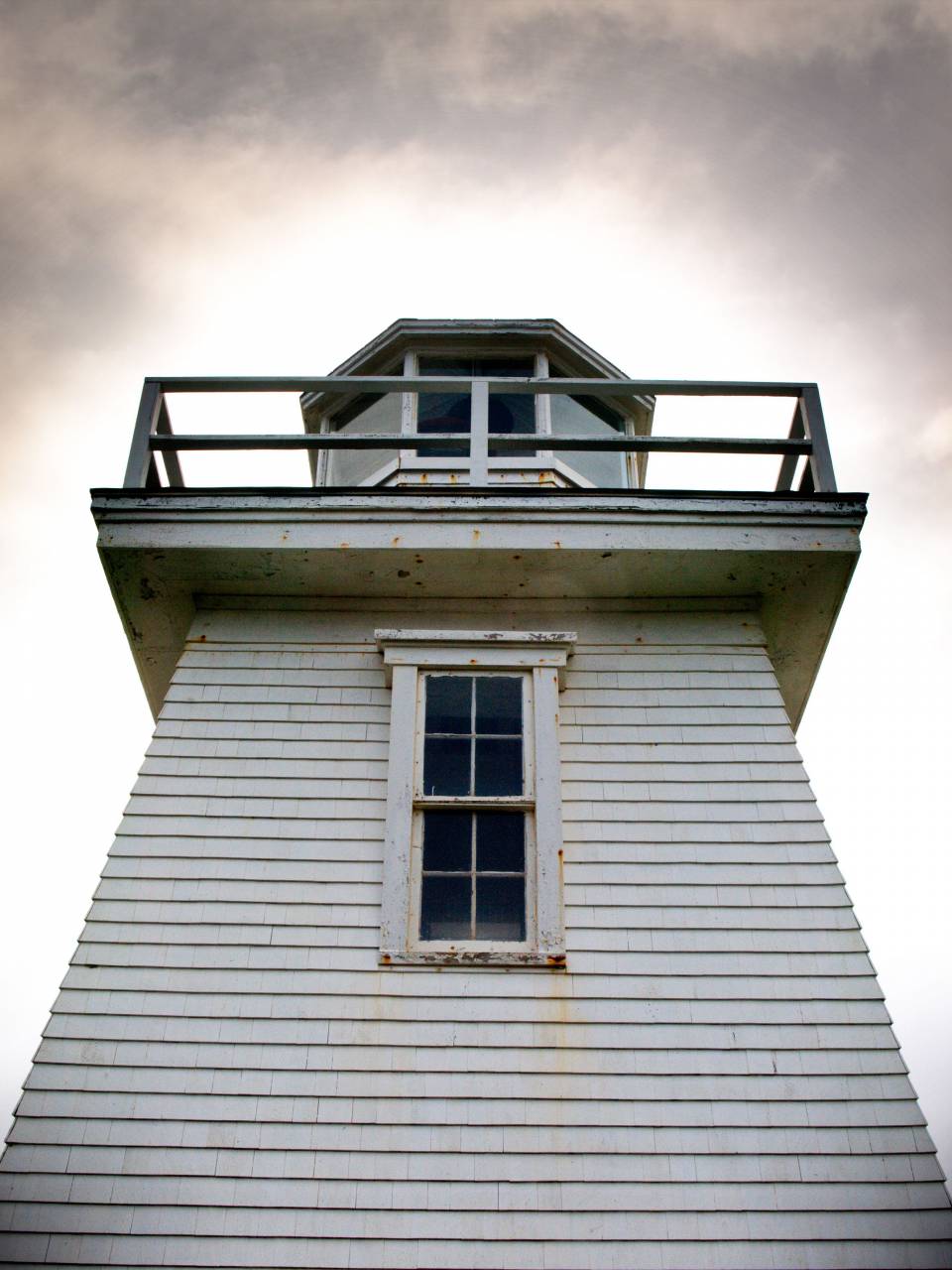 lighthouse, sky, architecture, coast, island, landmark, light, building, scenic, historic, weather, window, close up, vintage, old, black and white
, 