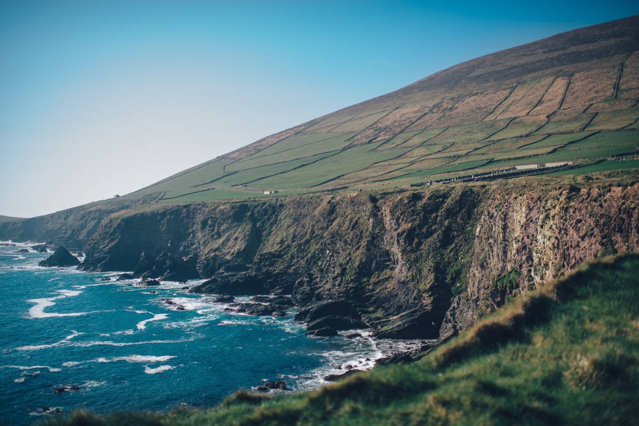 ocean, sea, coast, waves, water, cliffs, mountains, hills, fields, grass, landscape, nature, blue, sky, sunshine, summer, outdoors, travel, vacation
, 