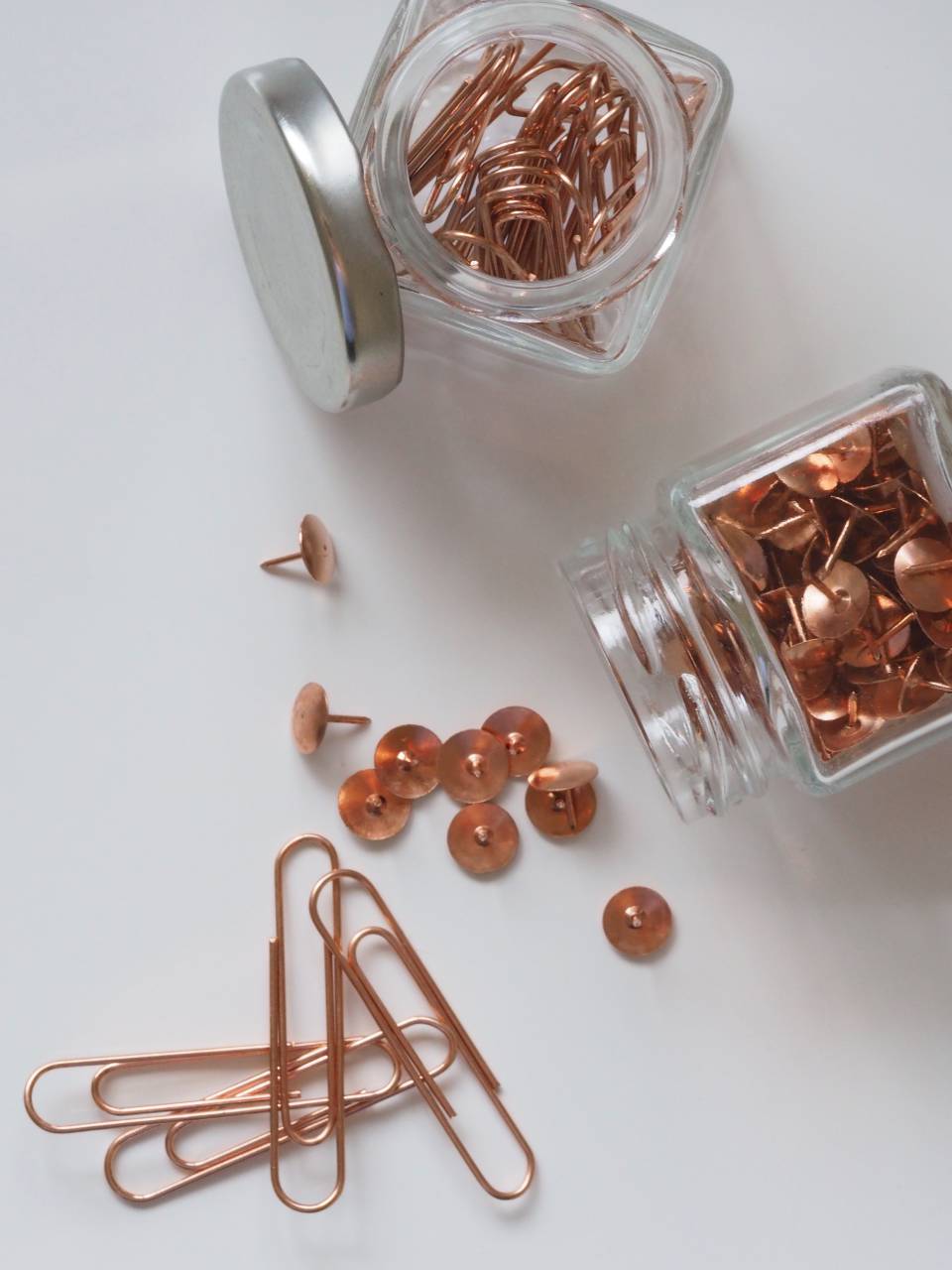 paper clips, pins, jars, glass, lid, open, white background, office, desk, business
, 