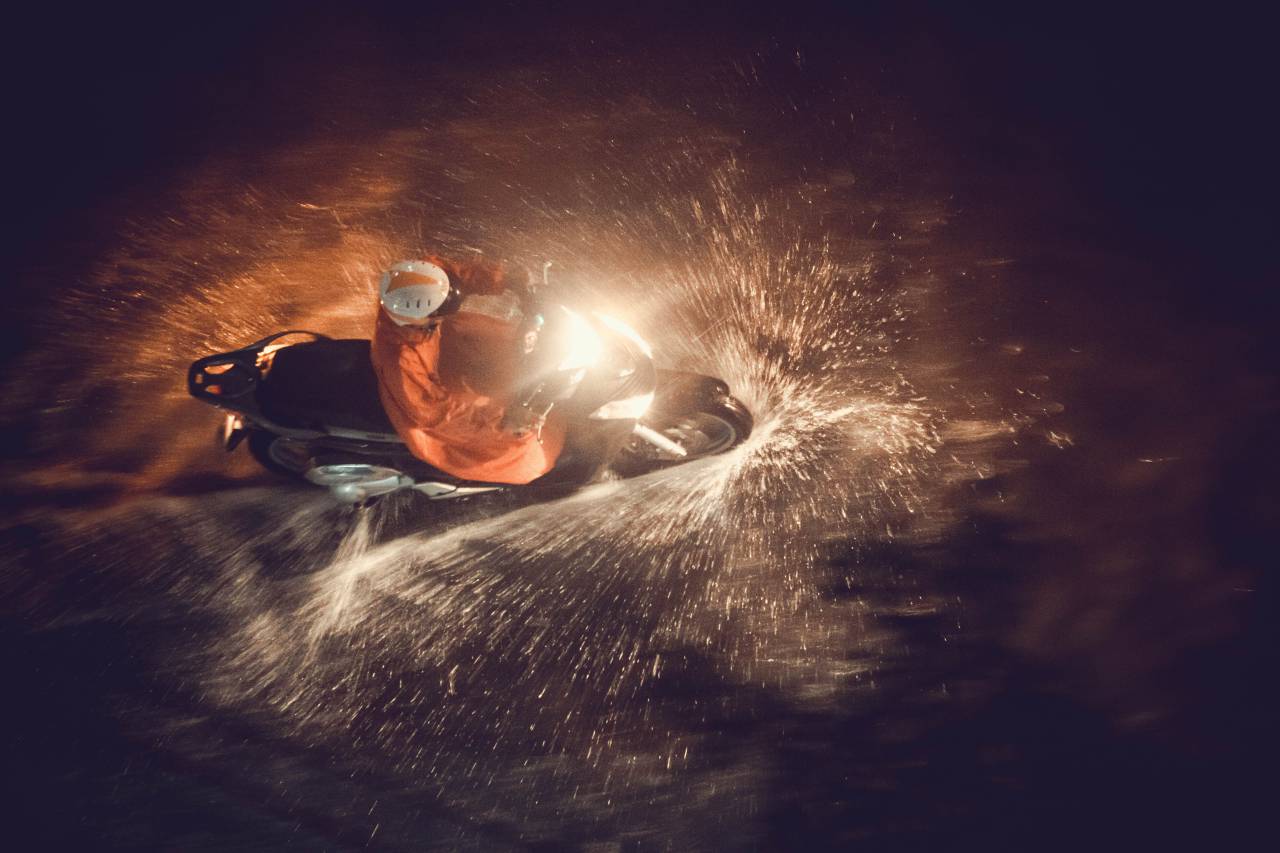 people, man, riding, driving, motorcycle, travel, water, flood, raining, helmet, raincoat
, 