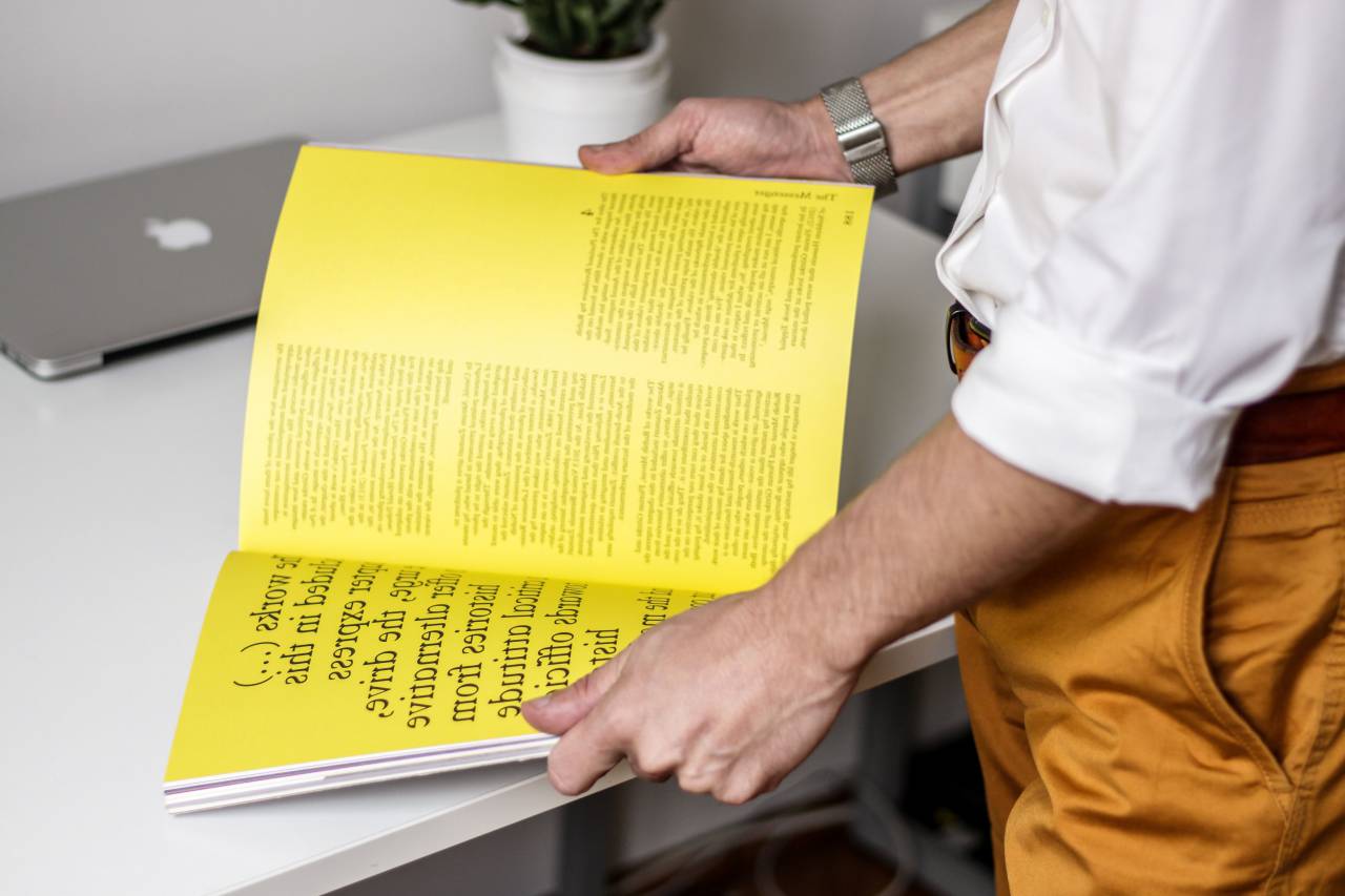 people, man, reading, book, magazine, table
, 