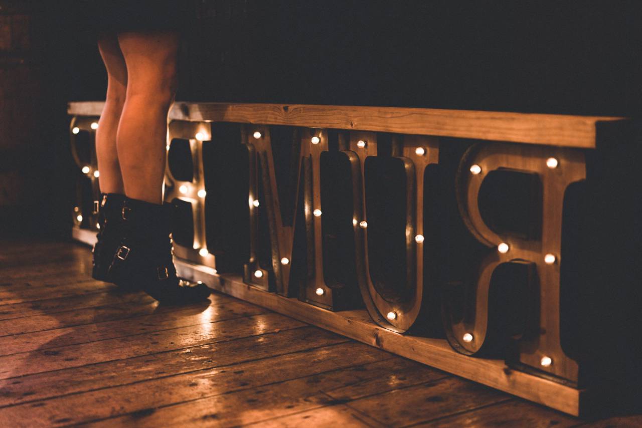 people, woman, boots, lights, text, feet, knee, legs
, 
