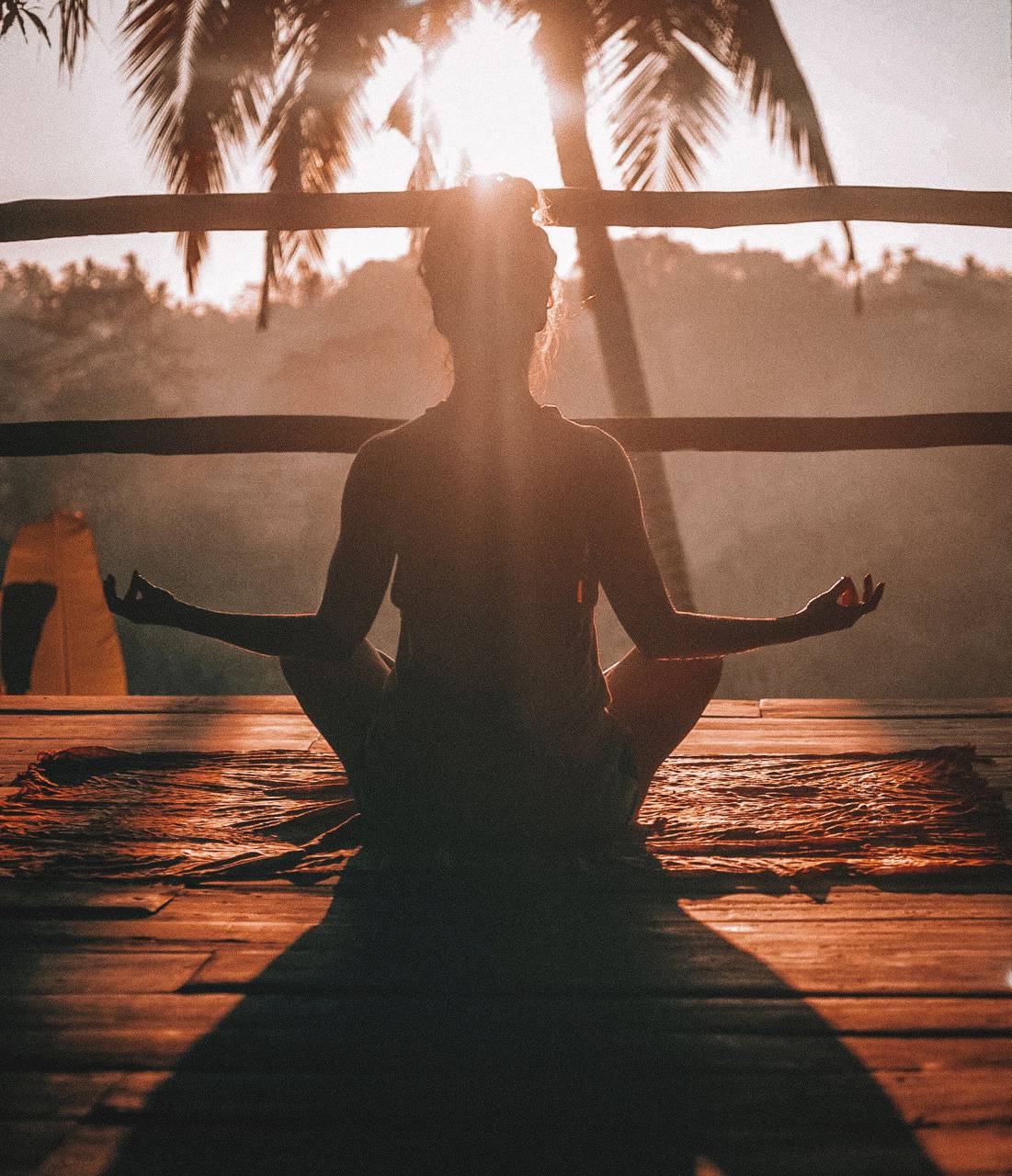woman;meditation,yoga,lifestyles,sunset,men,meditating,relaxation,women,healthy lifestyle,exercising,outdoors,nature,one person,adult,sport,relaxation exercise,serene people,back lit,spirituality,tranquil scene,sitting,lotus position,wellbeing,sunlight,sunrise,dawn,sun,young adult,summer,caucasian ethnicity,silhouette, 