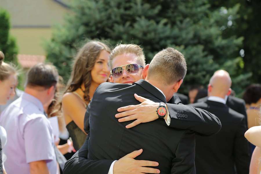 best man, businessperson, hugging 