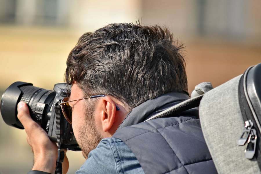 camera, holding, paparazzi, photographer 