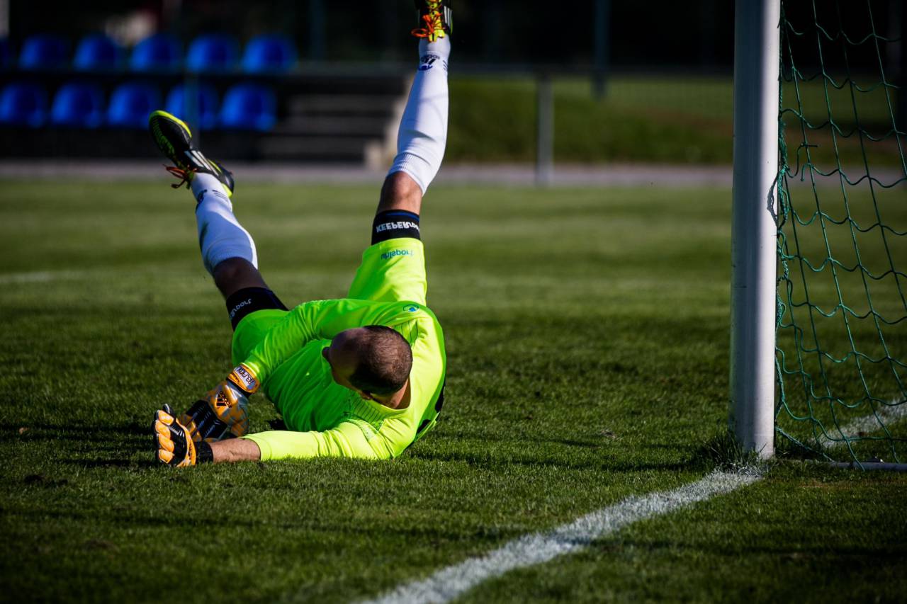 goalkeeper, sport, soccer, football, player, ball, goal, background, competition, game, action, man, athlete, team, goalie, training, field, keeper, person, match, competitive, catch, playing, championship, jump, motion, active, activity, equipment, success, players, sportswear, athletic, defense, soccer goalkeeper, 