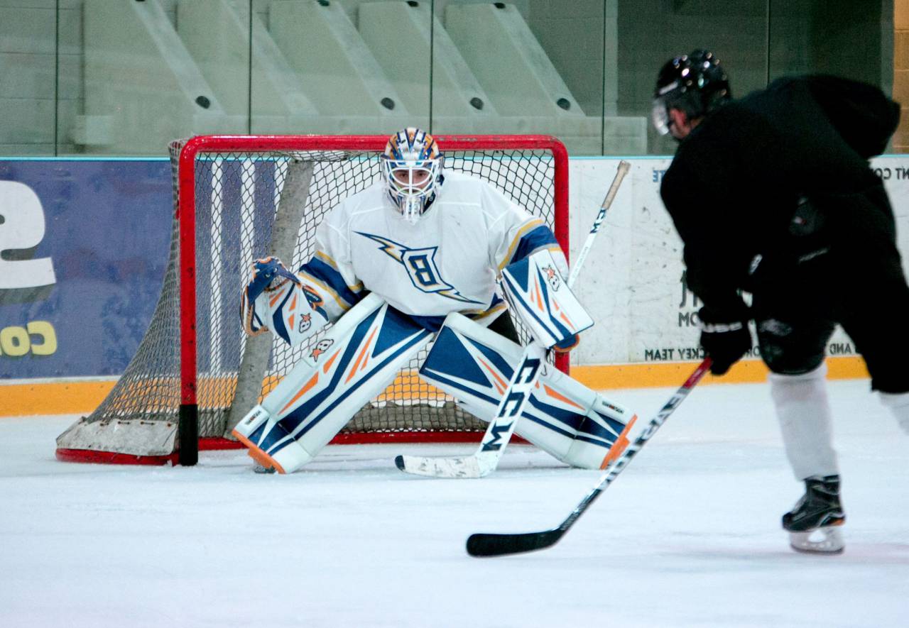 helmet, stick, goalkeeper, sport, hockey, equipment, winter, goal, game, puck, ice, team, player, athlete, white, professional, skate, play, background, uniform, goalie, competition, action, protection, mask, rink, person, skating, glove, people, net, red, graphic, sports, black, design, symbol, skill, man, isolated, goaltender, abstract, icon, motion, sign, stadium, 