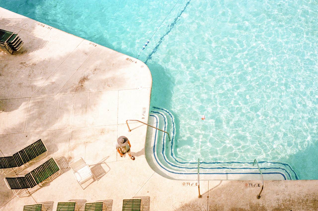 pool, water, top, summer, blue, resort, view, vacation, lifestyle, leisure, background, holiday, swim, sunny, beach, relax, hotel, travel, tropical, swimming, sea, above, spa, inflatable, aerial, fun, relaxation, young, rest, nobody, wave, poolside, bikini, woman, outdoor, surface, sunlight, sun, reflection, party, transparent, abstract, ring, bright, wet, clean, person, aqua, texture, floating, 