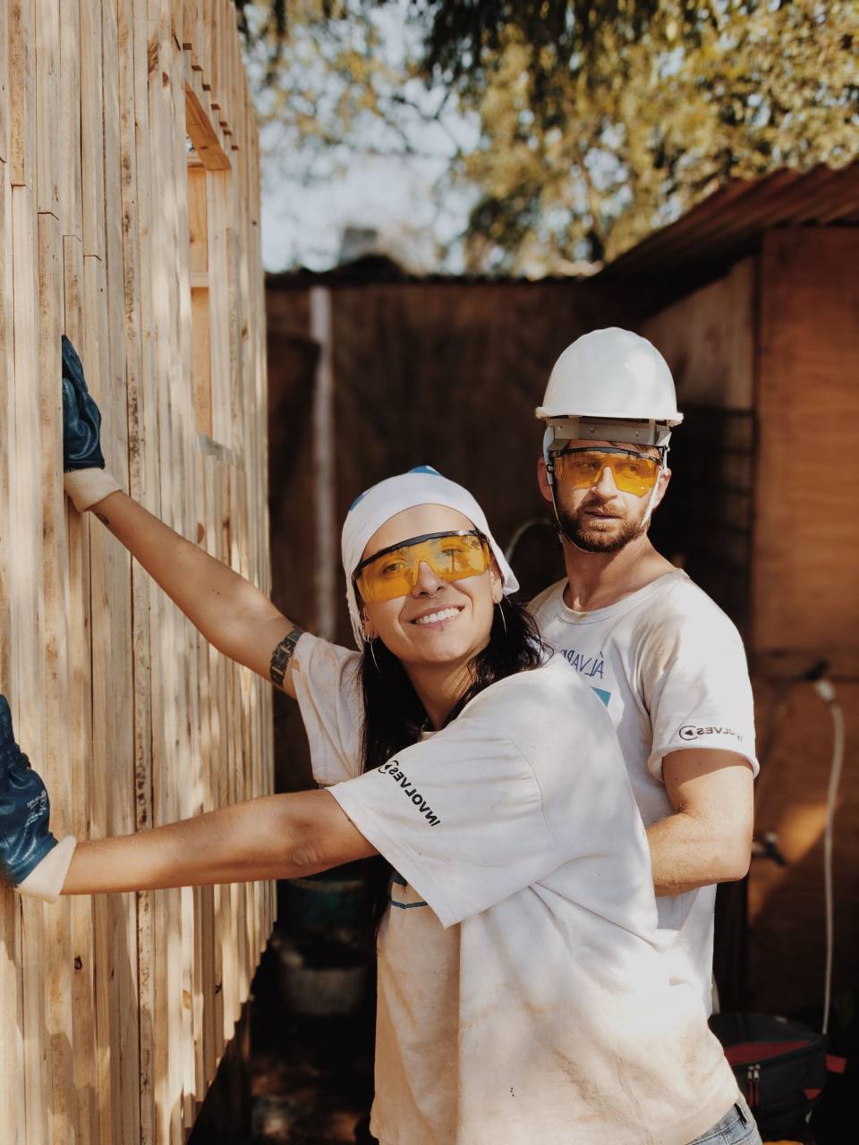 construction worker,men,outdoors,smiling,adult,caucasian ethnicity,males,construction industry,construction worker,occupation,women,two,people,happiness,working,cheerful,hardhat, 