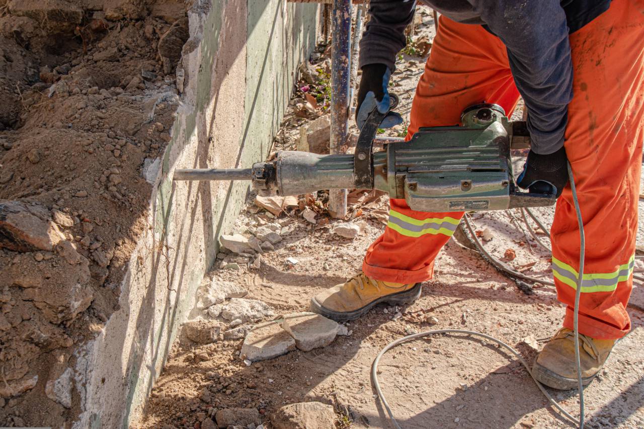construction worker,construction industry,working,construction site,men,occupation,construction worker,outdoors,industry,building,activity,hardhat,building contractor,work tool,equipment, 