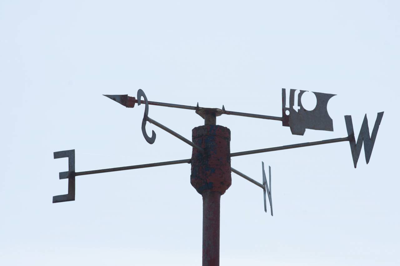 Wind vane, close-up, blue sky, weather, wind direction, instrument, technology, science, meteorology, forecasting, measurement, navigation, sailing, transportation, aviation, aerodynamics, wind speed, orientation, motion, air currents, atmospheric, climate, forecast, windmill, energy, 