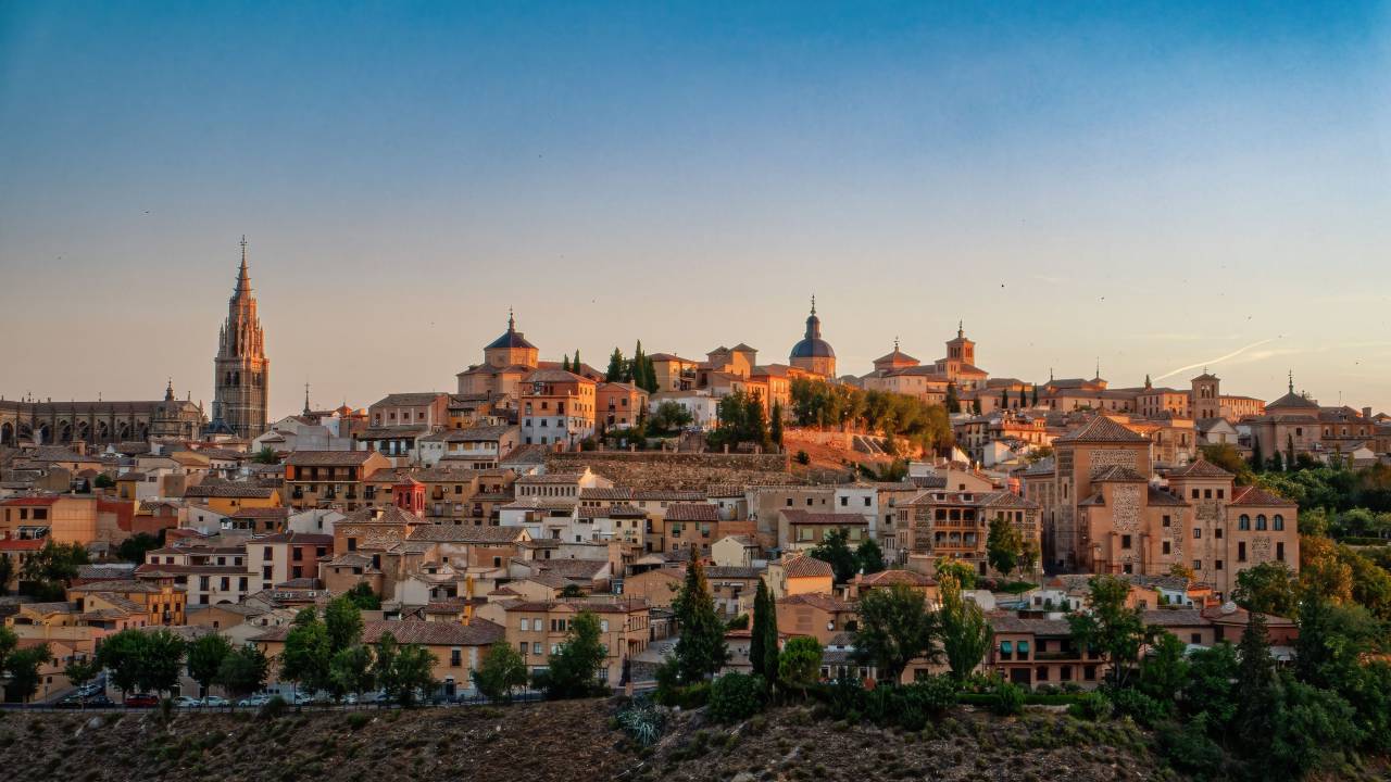 Toledo, Spain, Cityscape, Historical architecture, UNESCO World Heritage, Medieval city, El Greco, Tagus River, Alc?zar of Toledo, Cathedral of Toledo, Moorish influence, Jewish Quarter, Spanish culture, Ancient city, Toledo skyline, Castilla-La Mancha, Urban panorama, Cultural heritage, Spanish history, Narrow streets, Spanish landmarks, Plaza de Zocodover, Toledo at dusk, City walls, European travel, 