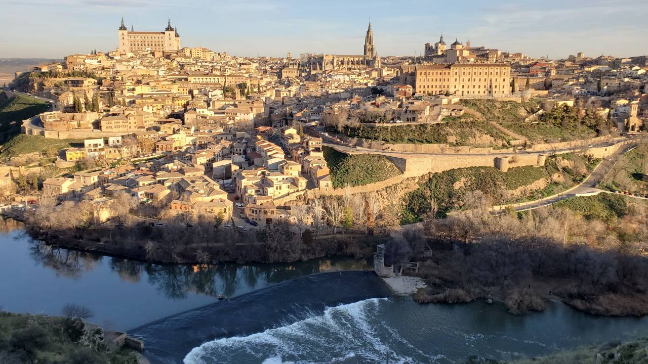 Toledo, Spain, Cityscape, Historical architecture, UNESCO World Heritage, Medieval city, El Greco, Tagus River, Alc?zar of Toledo, Cathedral of Toledo, Moorish influence, Jewish Quarter, Spanish culture, Ancient city, Toledo skyline, Castilla-La Mancha, Urban panorama, Cultural heritage, Spanish history, Narrow streets, Spanish landmarks, Plaza de Zocodover, Toledo at dusk, City walls, European travel, 