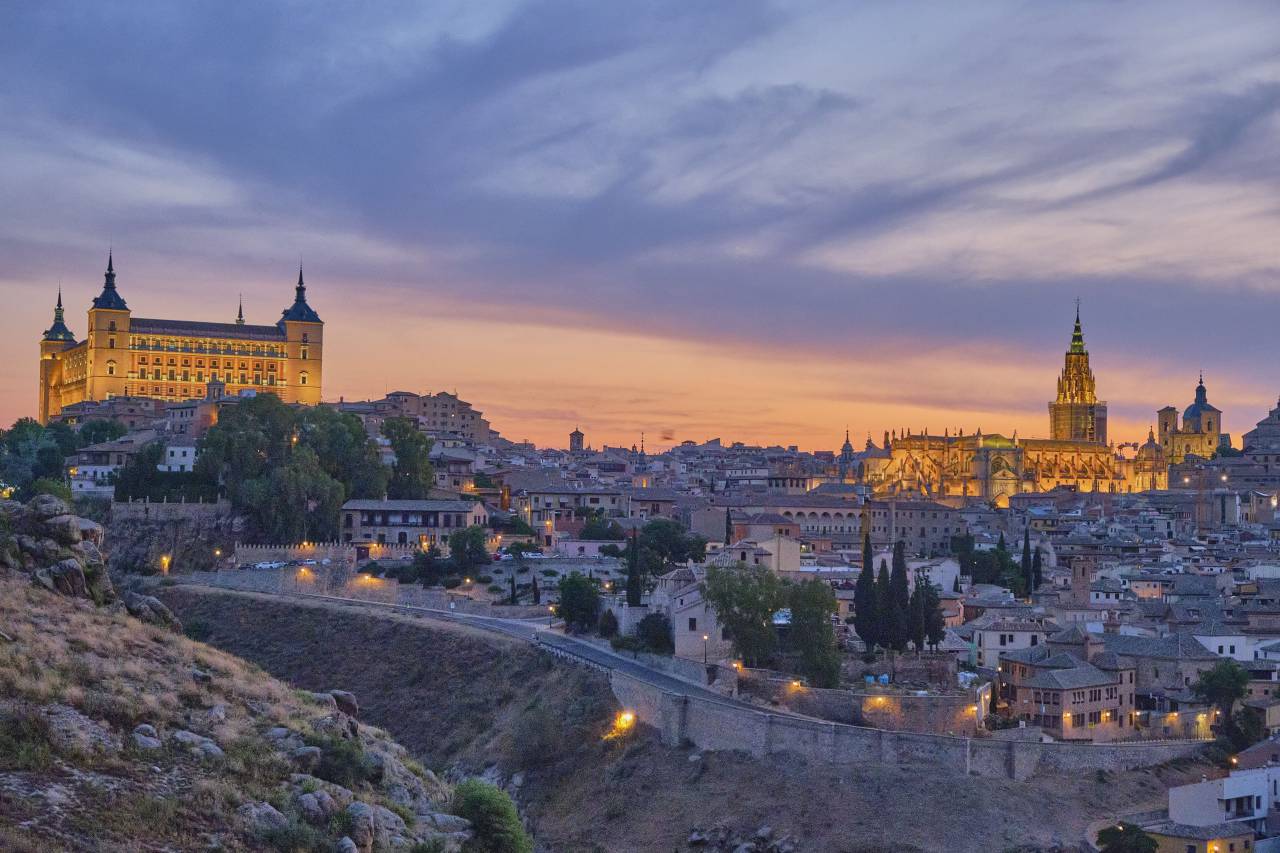 Toledo, Spain, Cityscape, Historical architecture, UNESCO World Heritage, Medieval city, El Greco, Tagus River, Alc?zar of Toledo, Cathedral of Toledo, Moorish influence, Jewish Quarter, Spanish culture, Ancient city, Toledo skyline, Castilla-La Mancha, Urban panorama, Cultural heritage, Spanish history, Narrow streets, Spanish landmarks, Plaza de Zocodover, Toledo at dusk, City walls, European travel, night, 