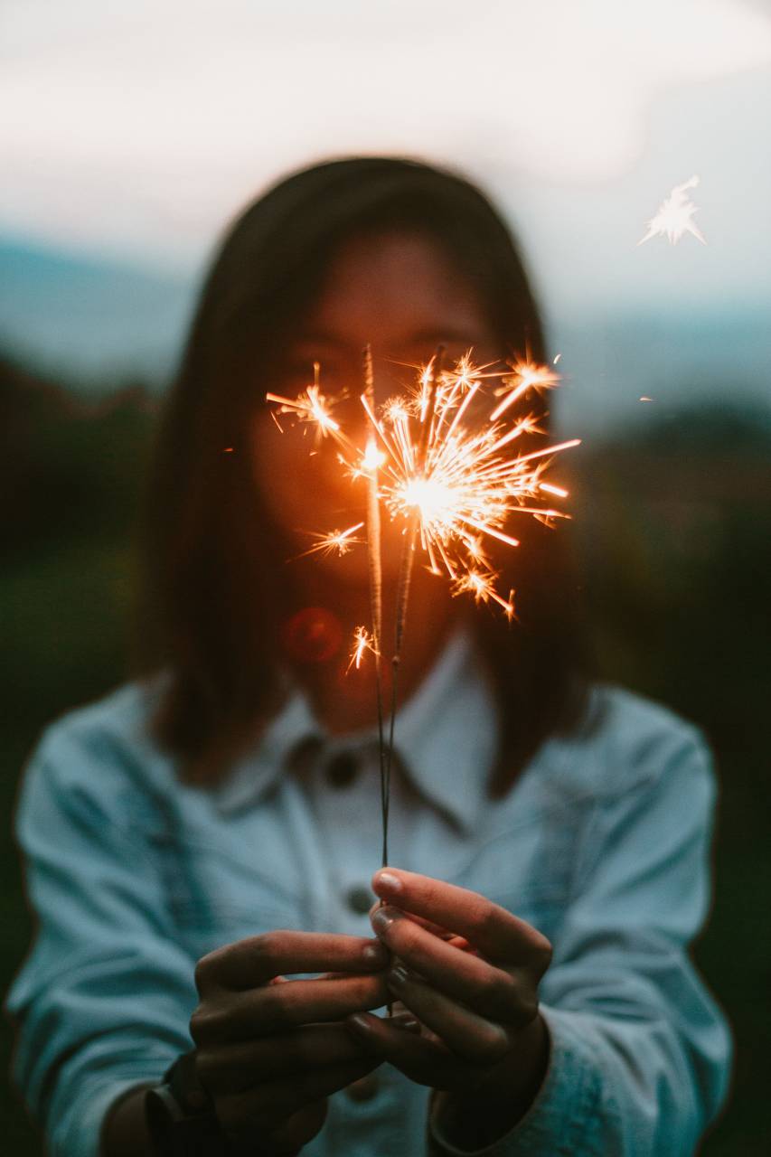 happy, woman, holiday, party, christmas, sparkler, holding, happiness, young, celebration, beautiful, fun, night, birthday, fire, people, girl, firework, man, laughing, bright, celebrating, black, new, female, sparkle, light, friends, lit, hand, cheerful, year, person, celebrate, together, burning, winter, lit sparkler, new year, background, joy, enjoyment, sparkling, evening, lifestyle, event, 