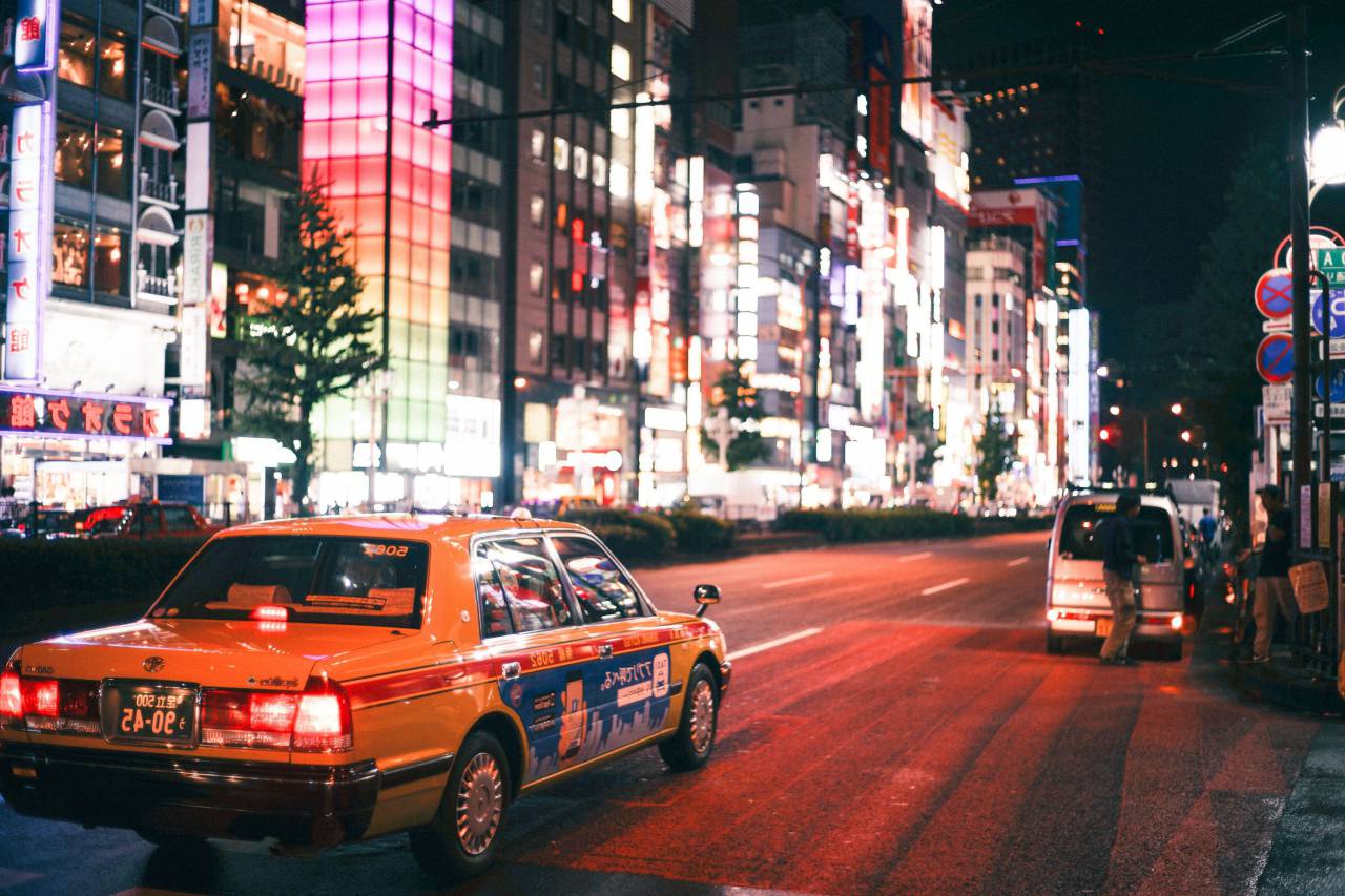 car, van, vehicle, road, street, city, night, lights, people, men, building, structure, tree
, 
