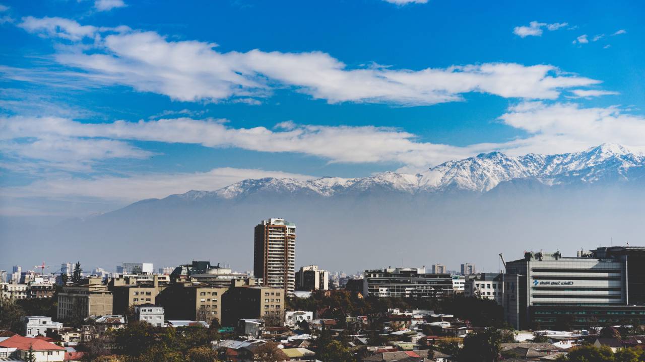 city, buildings, mountains, cityscape, sky, clouds, snow, peaks, horizon, view, scenic, skyline, business, architecture, homes, houses, valley
, 