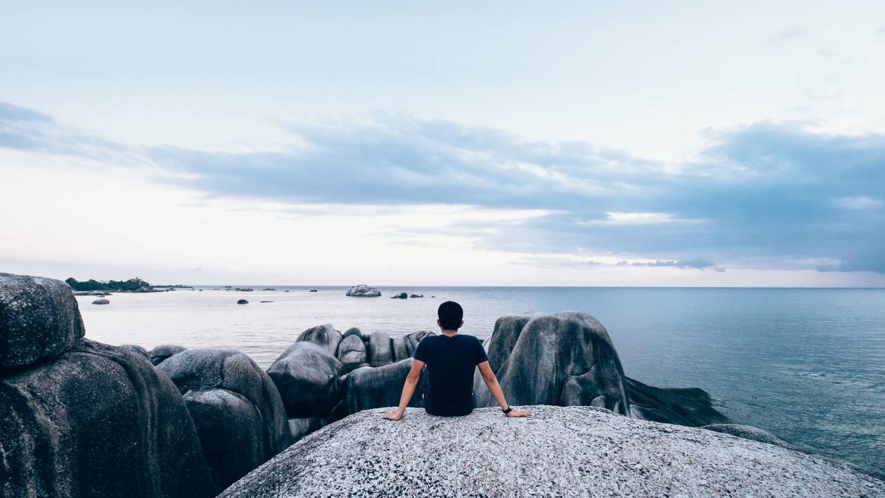 guy, man, rocks, boulders, coast, ocean, sea, water, sky, clouds, nature, landscape, people
, 