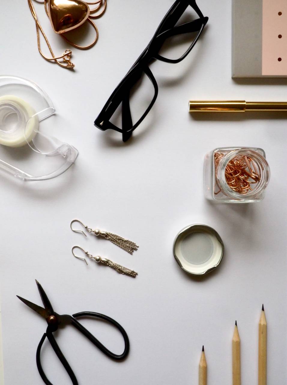 office, essentials, tools, glasses, notepad, pink, pencils, color, scissors, earrings, cellotape, paper clips, pens, white background, desk, business
, 