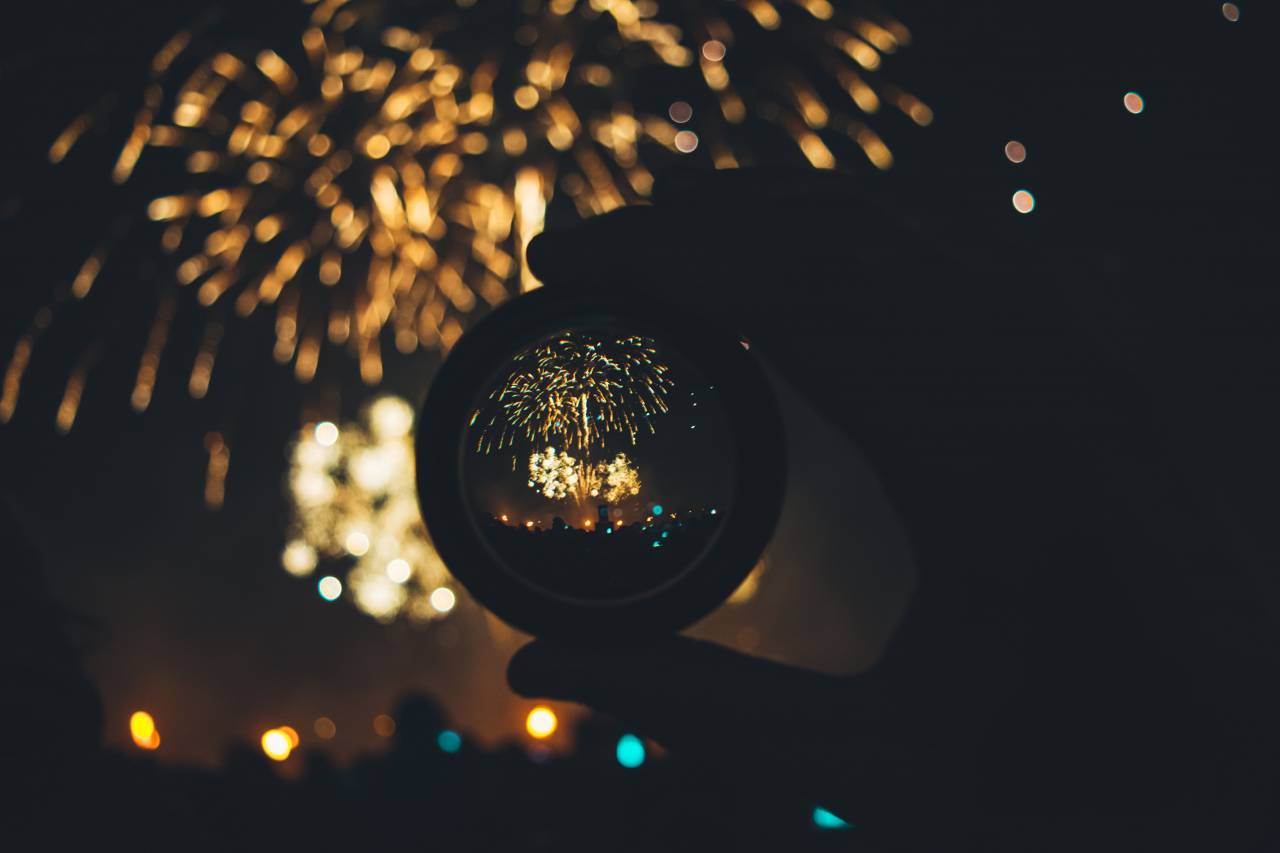 people, hand, snow globe, glass, circle, round, lights, fireworks, dark, night
, 