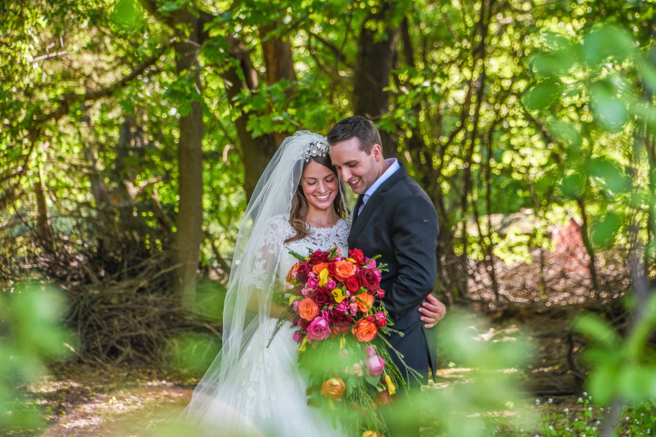 people, man, woman, hug, couple, marriage, wedding, gown, suit, smile, happy, love, bride, groom, bouquet, flower, green, plants, outdoor
, 