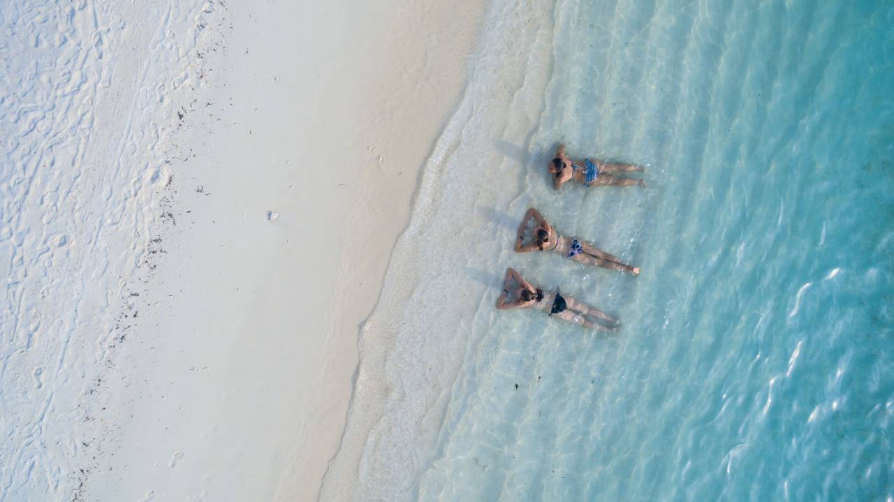 people, woman, swimsuit, bikini, ocean, sea, beach, sand, water, friends, aerial, relax, chill, travel, adventure, trip, vacation
, 