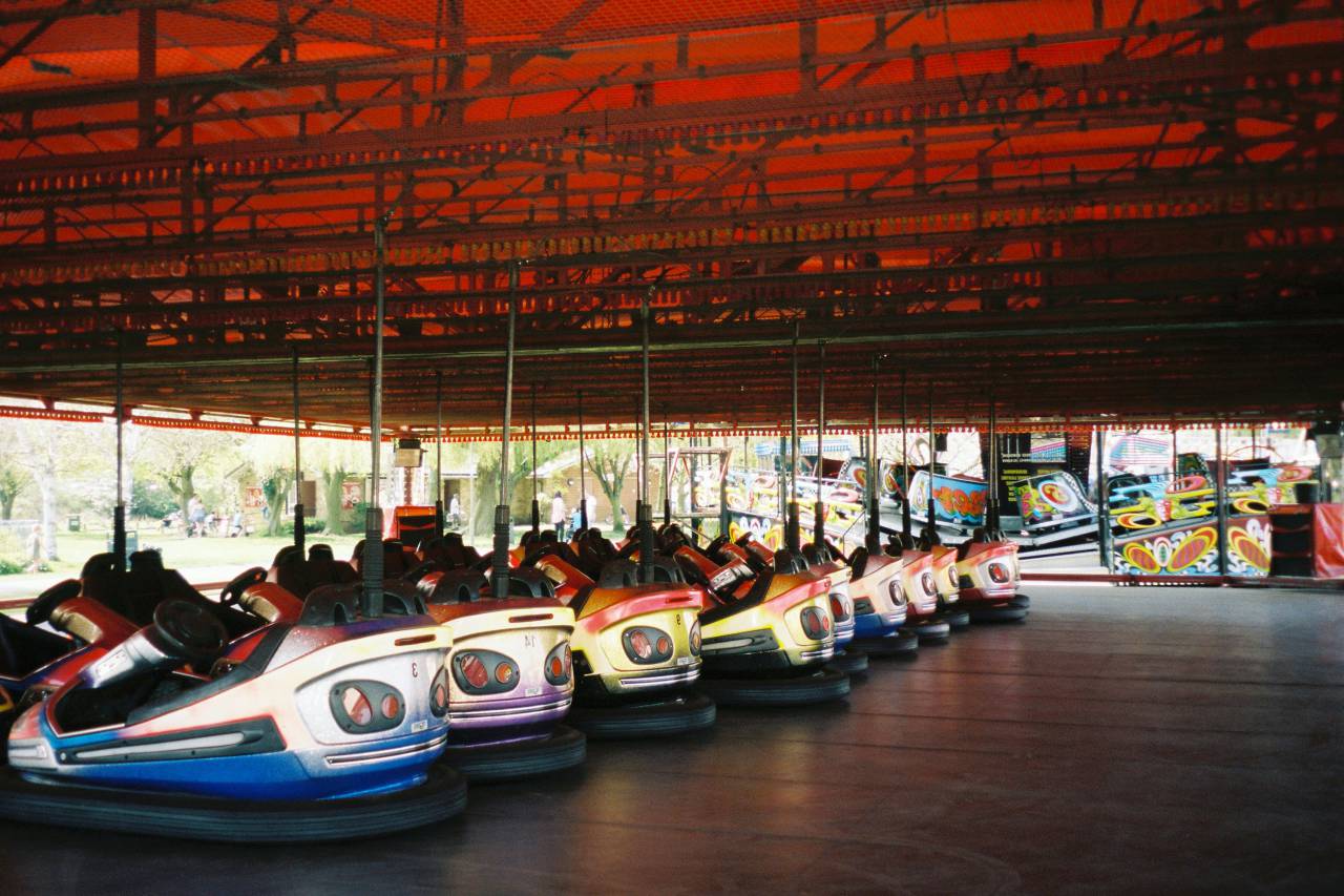 Amusement Park, Bumper Cars, Funfair, Entertainment, Ride, Collision, Thrills, Children, Playful, Carnival, Adrenaline, Spinning, Laughter, Electric Cars, Fairground, Family, Excitement, Classic, Summer, Enjoyment, 