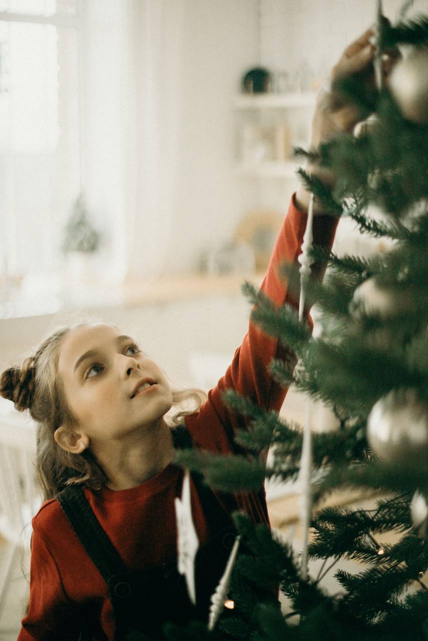 christmas, girl, decoration, celebration, family, tree, happy, holiday, new, xmas, child, people, home, winter, year, december, person, beautiful, kid, childhood, caucasian, cute, happiness, young, cheerful, decorating, woman, merry, festive, room, present, smiling, together, daughter, ball, female, red, lights, fun, mother, holidays, love, eve, joy, holding, lifestyle, leisure, traditional, garland, background, 