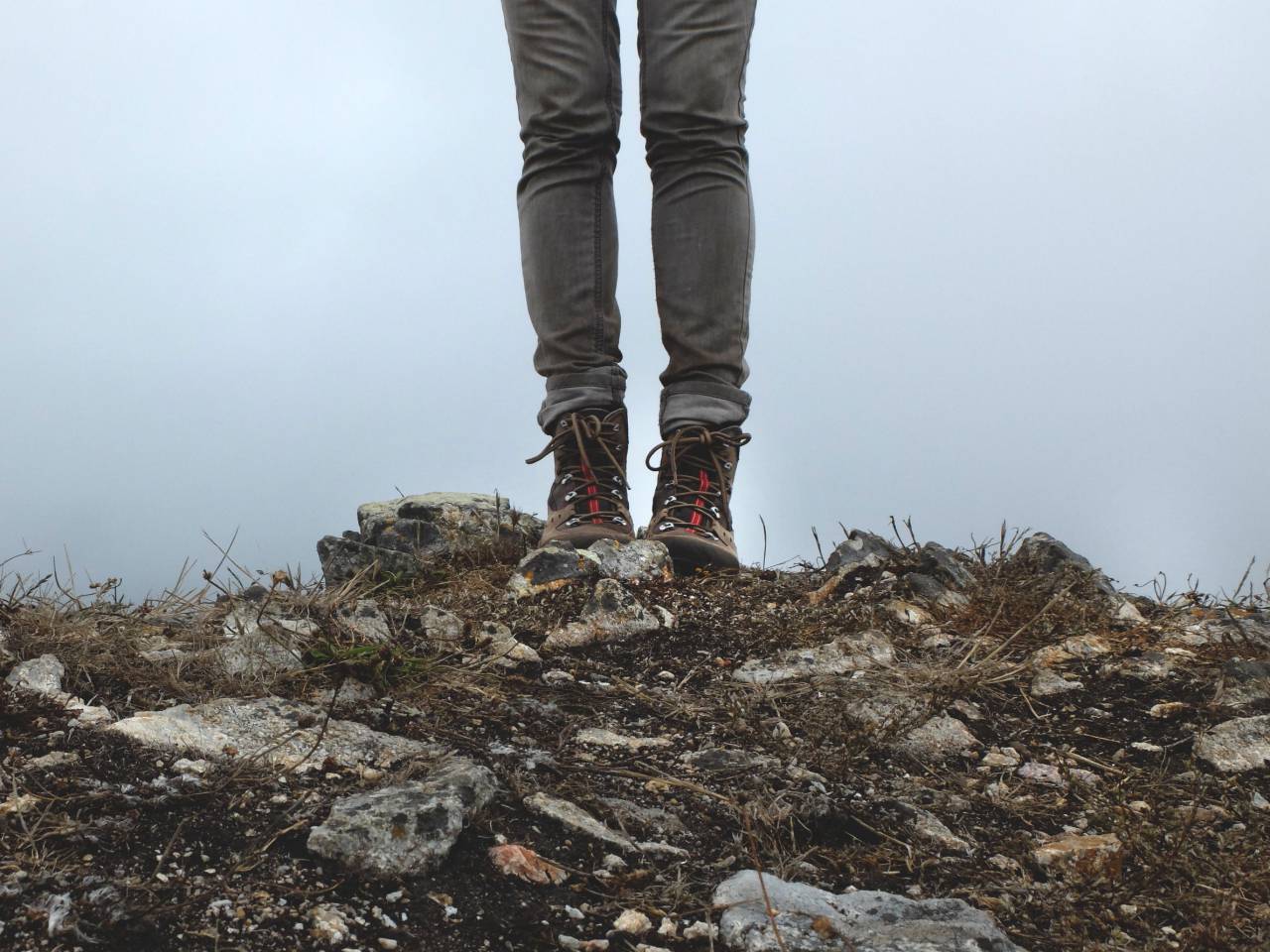 legs, pants, jeans, shoes, boots, laces, rocks, ground, soil, dirt
, 