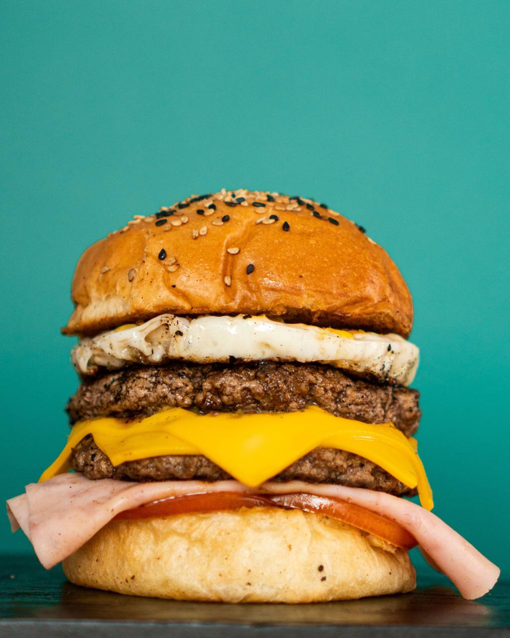 cheeseburger, burger, lunch, meal, hamburger, sandwich, food, american, fast, no people, meat, unhealthy, lettuce, dinner, cheese, bread, grilled, beef, vegetable, tasty, bun, snack, tomato, fast food, junk, wooden, isolated, eating, fat, diet, fastfood, delicious, studio, nutrition, rustic, cheddar, concept, big, fresh, sesame, health, healthy, photography, 