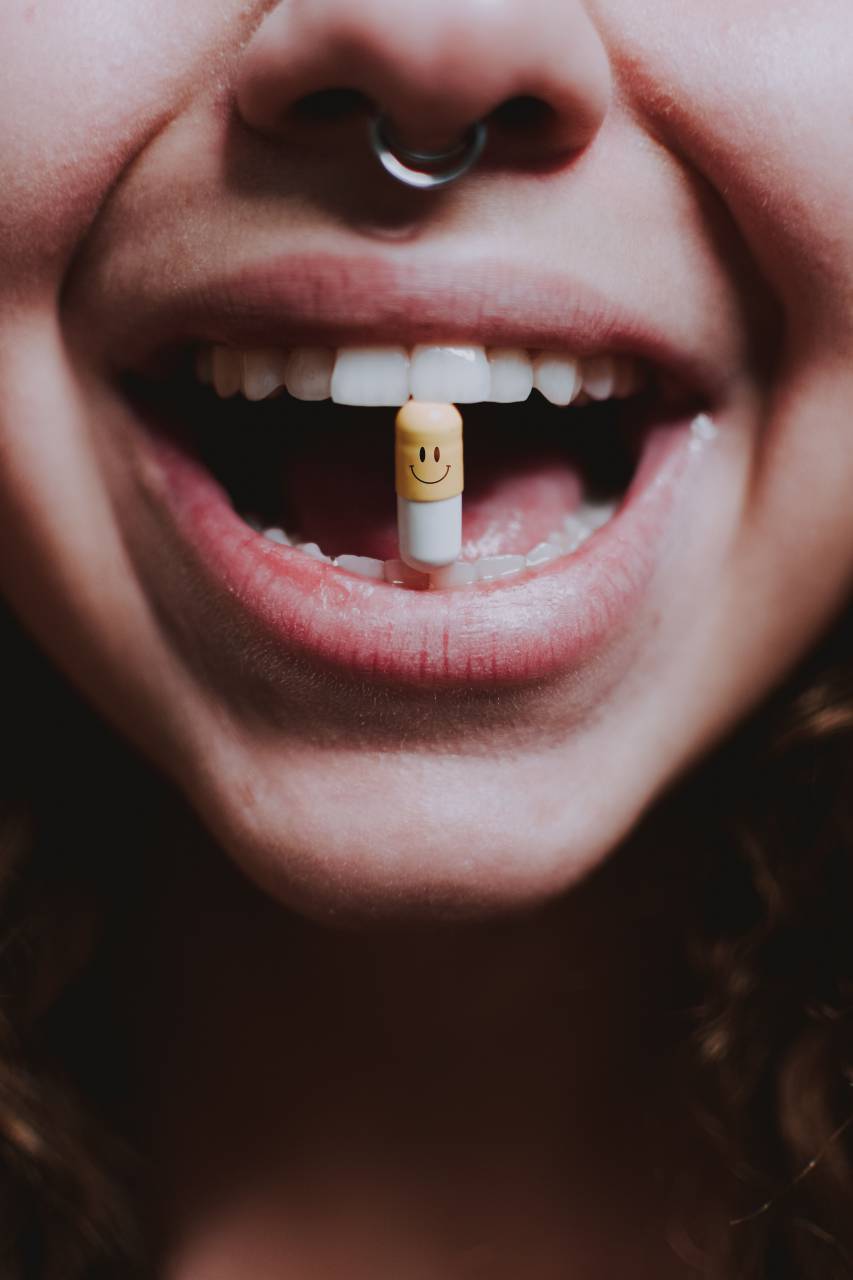 woman, medicine, female, young, girl, medical, pill, beautiful, person, adult, treatment, doctor, health, pills, biting, healthy, background, care, drug, illness, pharmacy, pain, white, tablet, people, capsule, brunette, disease, body, problem, looking, bite, beauty, anxiety, skin, vitamin, medication, nervous, fear, attractive, face, scared, caucasian, afraid, expression, stress, terrified, anxious, concept, nose ring, 