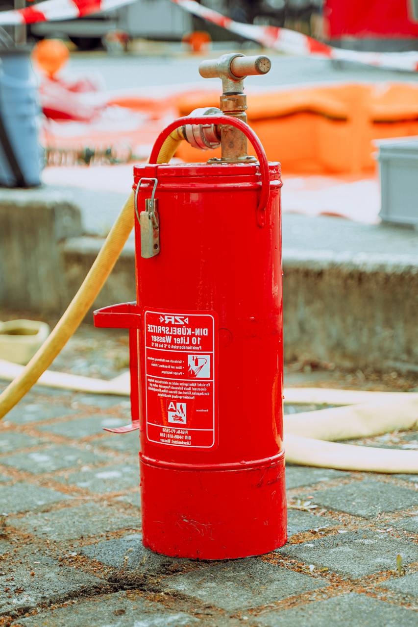 Flame, safety, prevention, suppressant, red, emergency, equipment, hose, nozzle, cylinder, extinguish, firefighting, hazard, security, evacuate, precaution, response, handle, pressure, safety pin, discharge, chemical, control, safety device, alert, precautionary, emergency tool, 